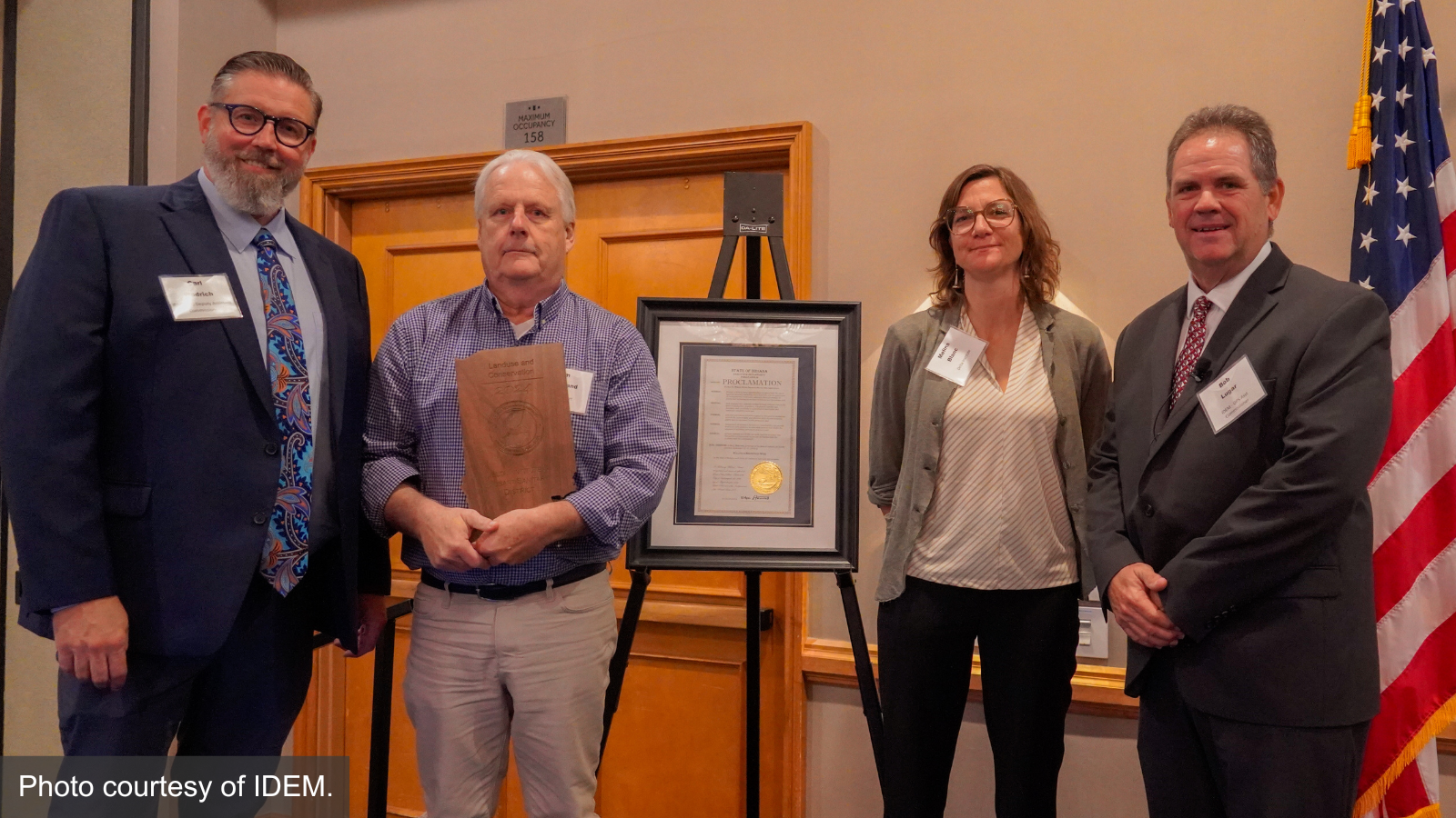 The Indiana Department of Environmental Management (IDEM) presented Delta Institute and the Hobart Sanitary District (HSD) the 2024 Indiana Governor's Award for Environmental Excellence for the Duck Creek Tributary Restoration on September 17, 2024. From left to right: Carl Wodrich, Deputy Assistant Commissioner of the IDEM Office of Program Support; Tim Kingsland, HSD Coordinator; Mélina Blanc, Senior Lead of Nature-Based Climate Solutions at Delta Institute; Bob Lugar, Assistant Commissioner of the IDEM Office of Program Support.